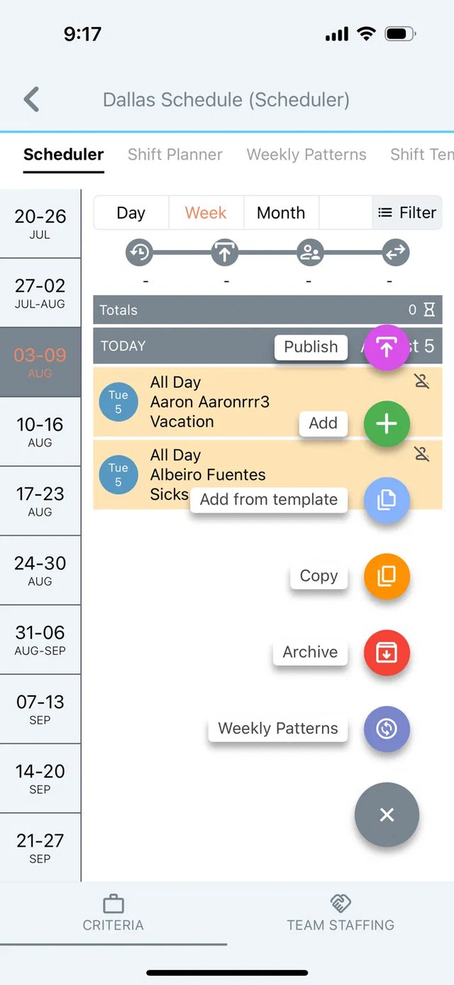 Original Workeasy app showing six unlabeled, brightly colored action buttons stacked on top of the schedule